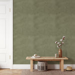 Wallpaper behind wooden bench and cotton stem decor – farmhouse hallway wallpaper, olive textured wall, earthy minimalist entryway