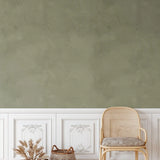 Wallpaper with wicker chair and pampas grass decor – boho green wallpaper, olive limewash accent wall, natural home style