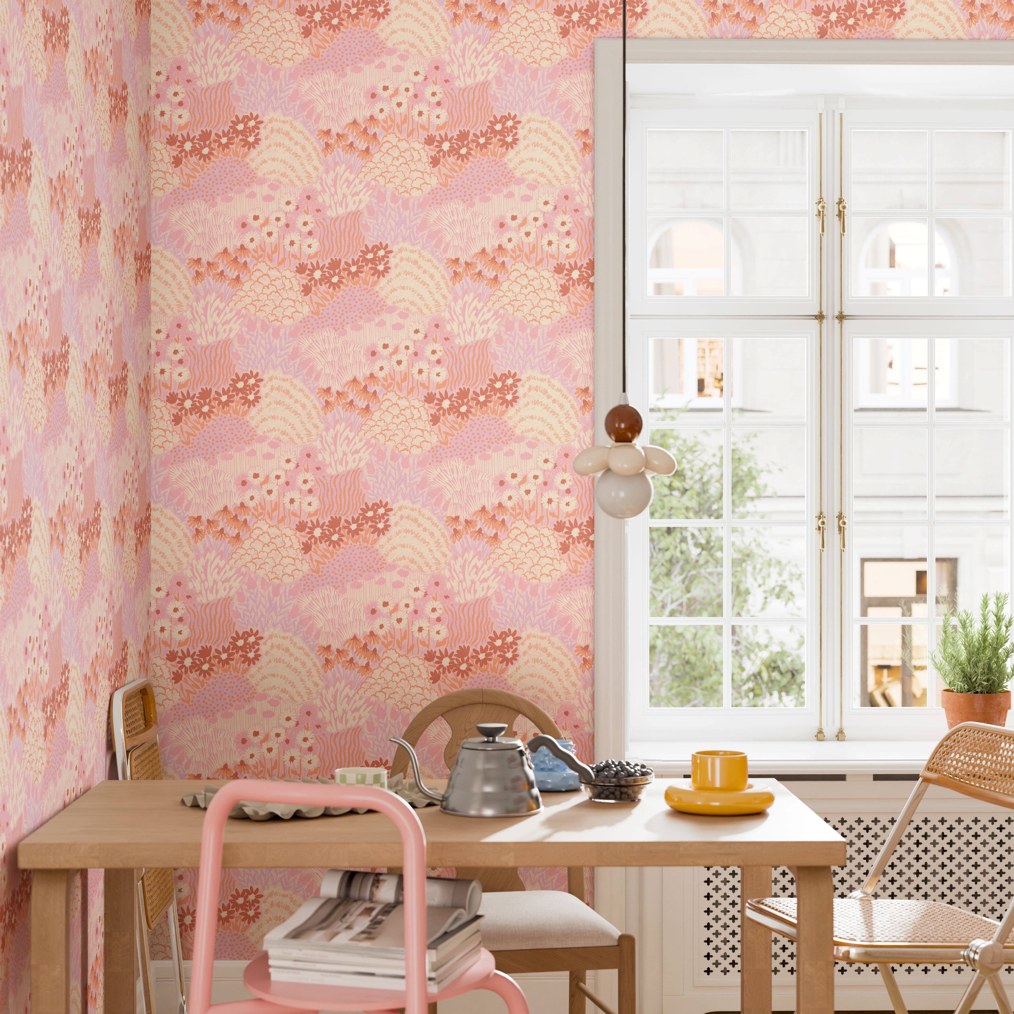 Cozy dining nook with bright window and bold floral peel-and-stick wallpaper