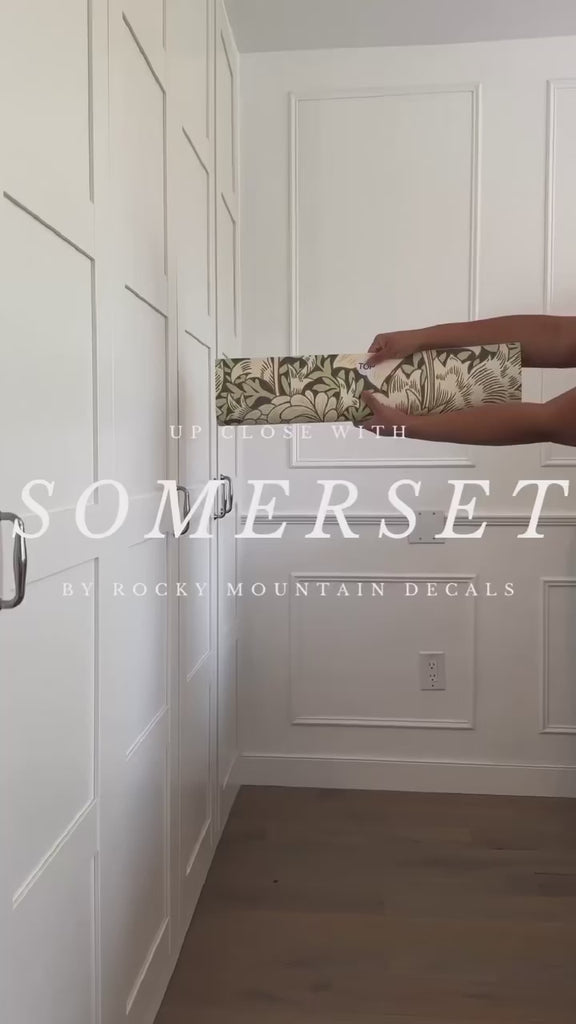 Unrolling Somerset peel and stick removable vintage wallpaper