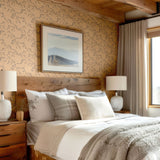 Rustic bedroom with Racing Pony wallpaper, wooden ceiling, and neutral decor.