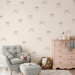 Neutral outline Bow Decals styled in a nursery with modern and cozy furnishings