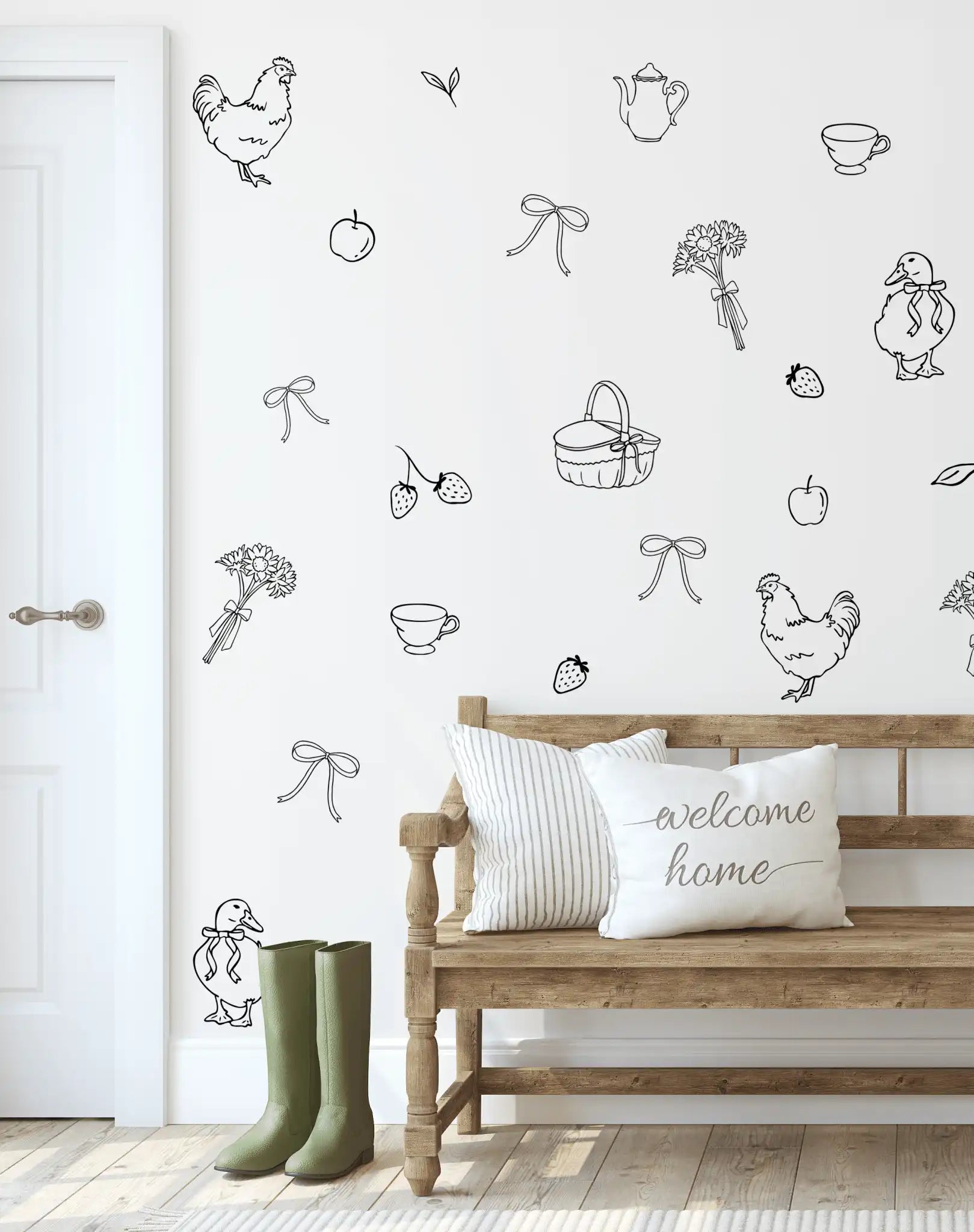 Cottage-style decals on white wall with bench and pillows