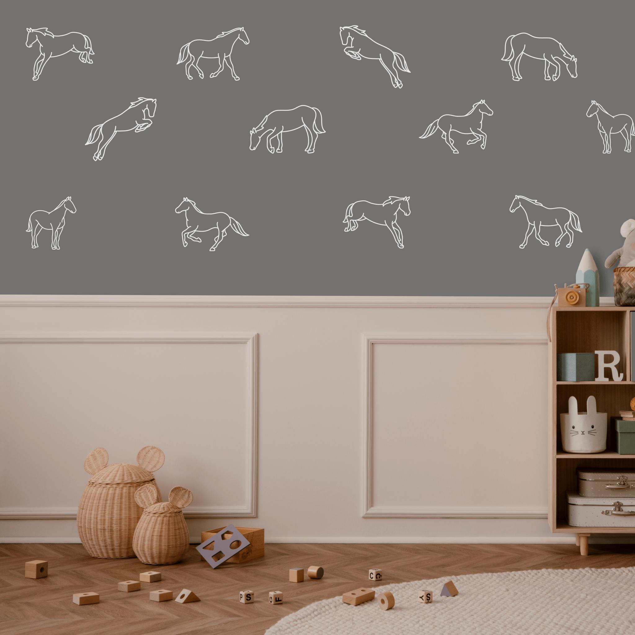 White outline horse decals in a modern kids’ playroom with gray walls