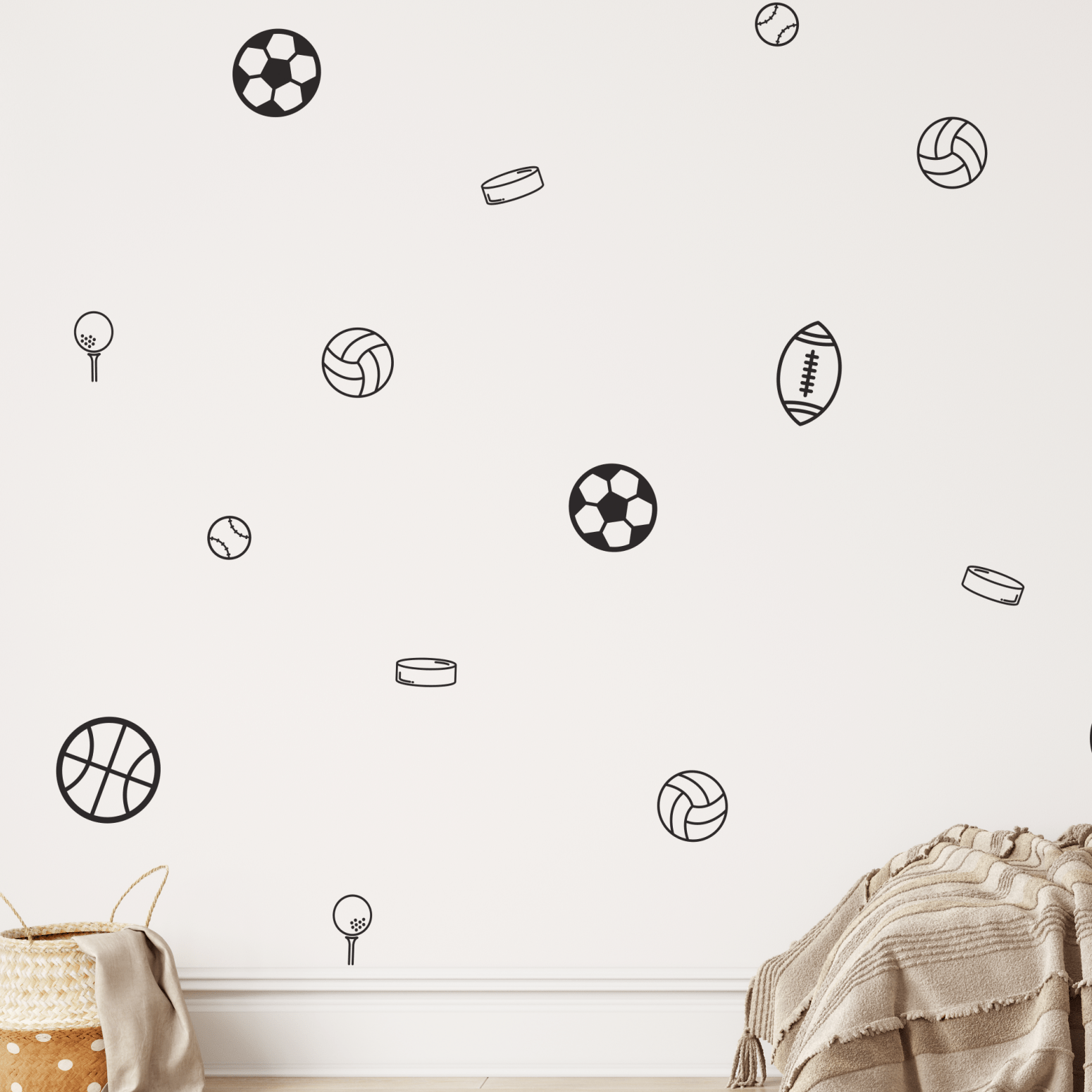 Simple sports wall decals in outline design on a white wall in a kids’ bedroom