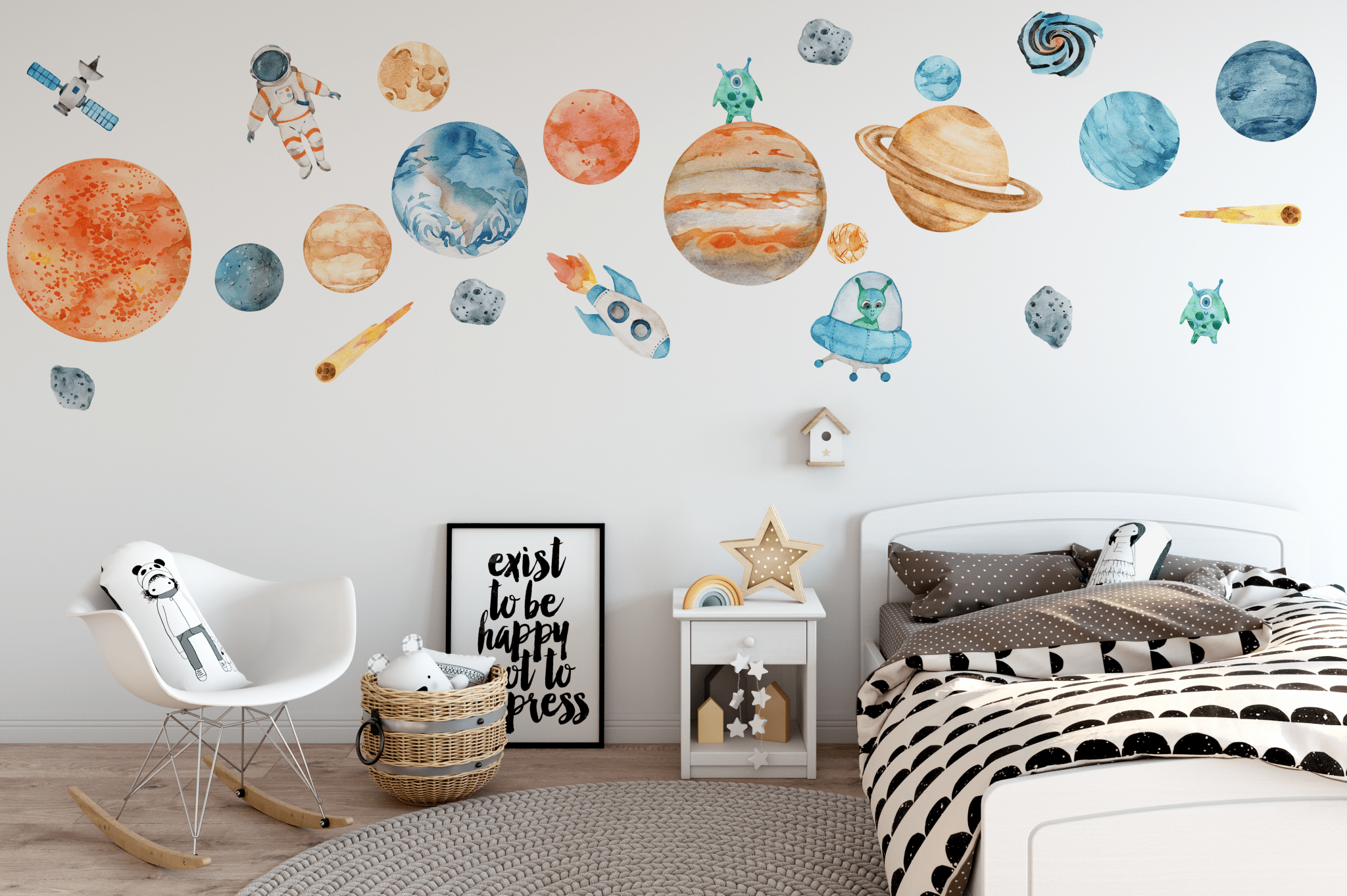 Kids' bedroom featuring colorful space-themed wall decals, including planets, rockets, astronauts, and aliens, adding a playful and educational touch