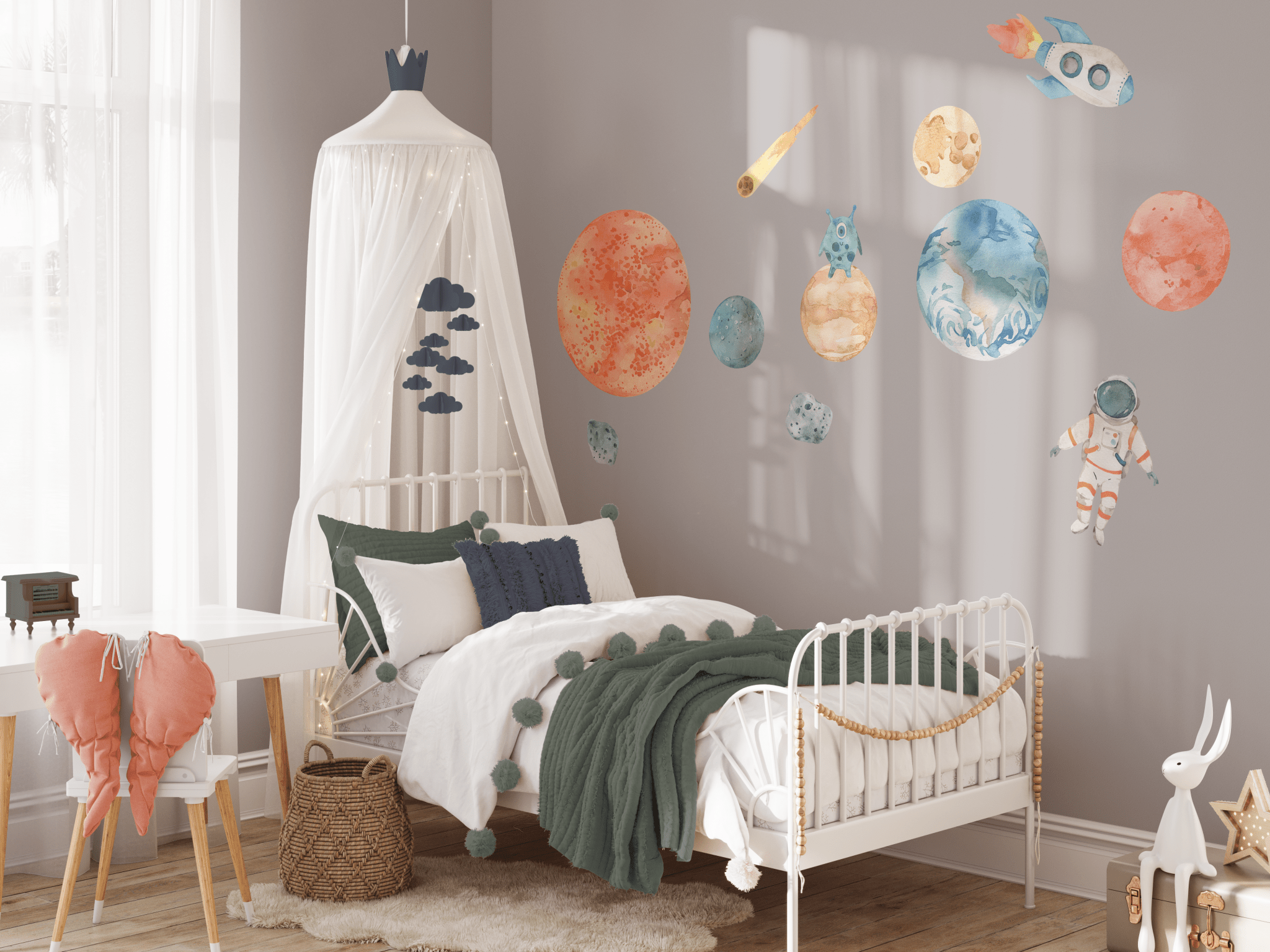 Cozy bedroom with space-themed wall decals, showcasing watercolor planets, rockets, and an astronaut for a whimsical space adventure theme