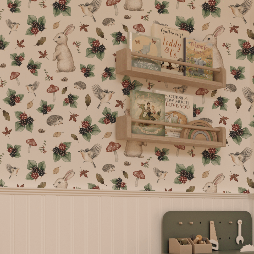 Storybook wallpaper featuring bunnies, blackberries, and woodland elements in a cozy countryside-inspired nursery.