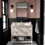 A chic bathroom interior featuring terracotta thornhill floral wallpaper that complements the dark trim and white furnishings.