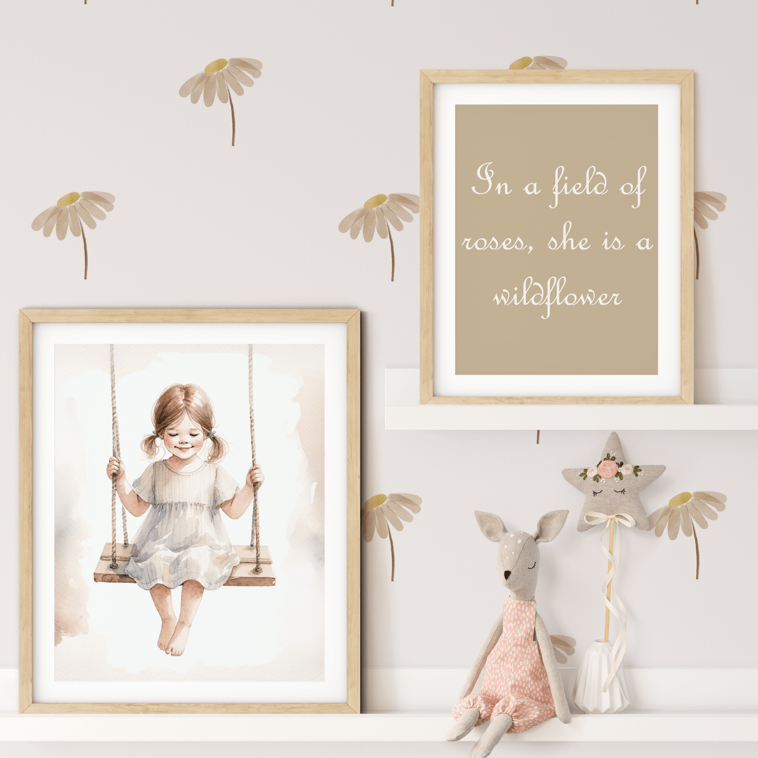 Neutral daisy wall stickers in a nursery setting with 'In a field of roses, she is a wildflower' framed print