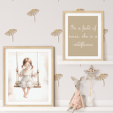 Neutral daisy wall stickers in a nursery setting with 'In a field of roses, she is a wildflower' framed print