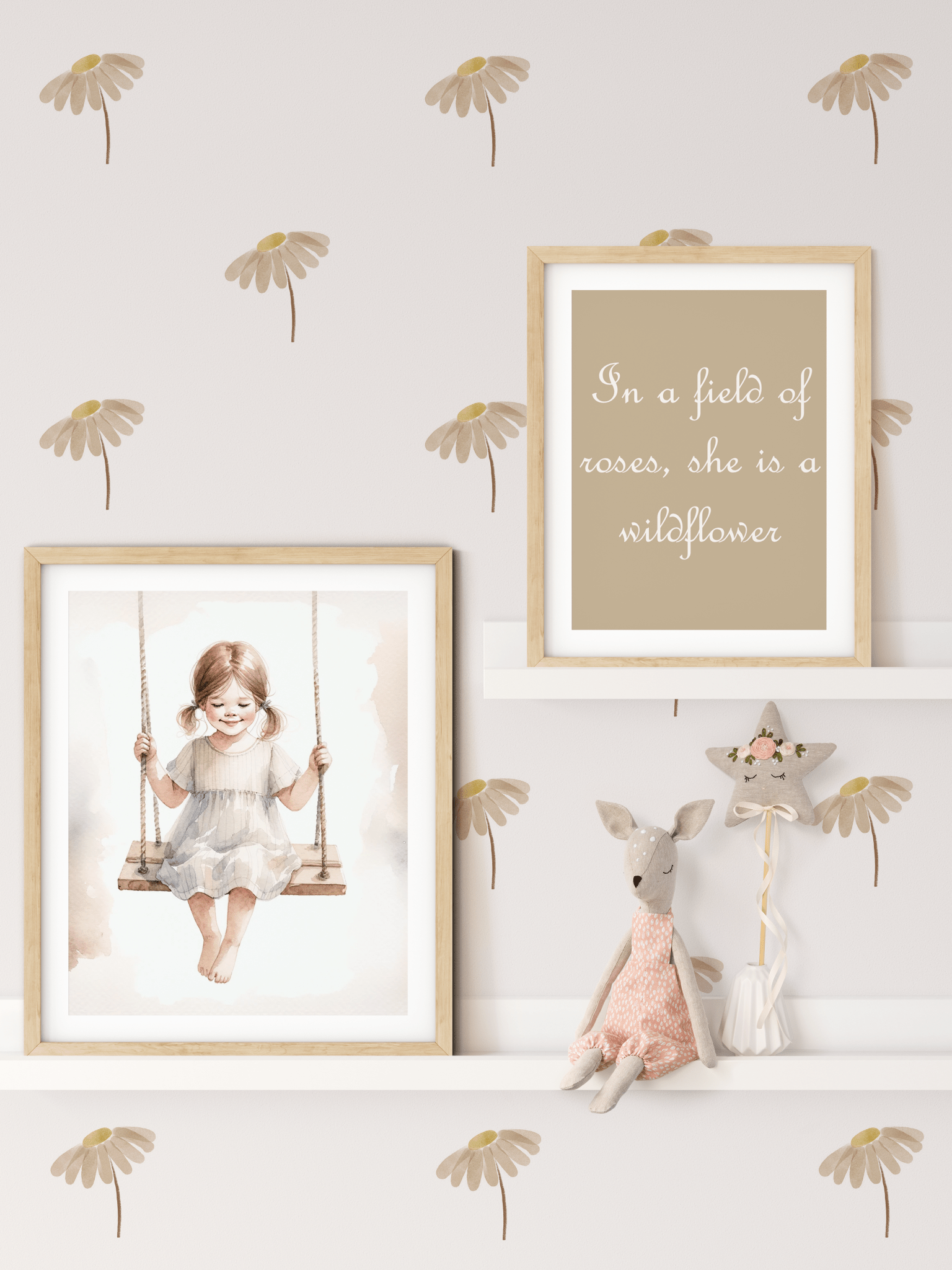 Neutral daisy wall stickers in a nursery setting with 'In a field of roses, she is a wildflower' framed print