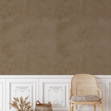 Rustic room featuring Brown Tuscany Limewash Wallpaper and white wainscoting