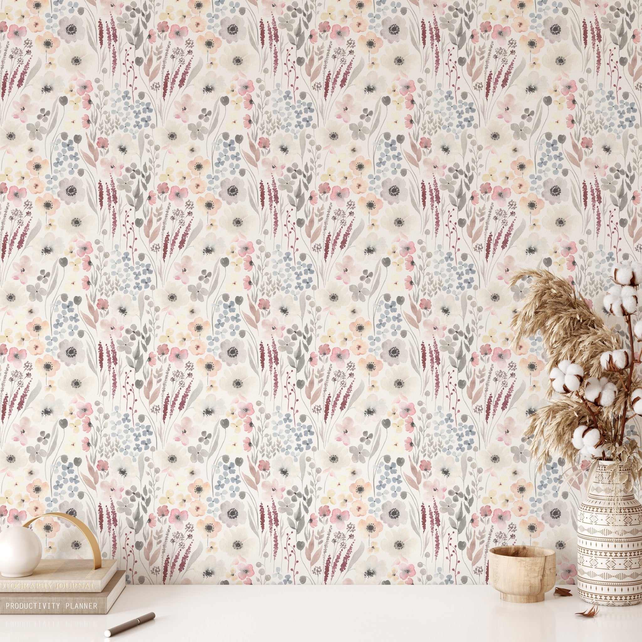 Home office styled with the Vintage Anemones peel and stick wallpaper, combined with a minimalist wooden desk, books, and dried floral arrangements, adding a touch of vintage charm to the space