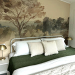 Bright daylight floods the bedroom, highlighting the detailed Vintage Landscape mural above the bed, accompanied by a mix of white and green pillows.