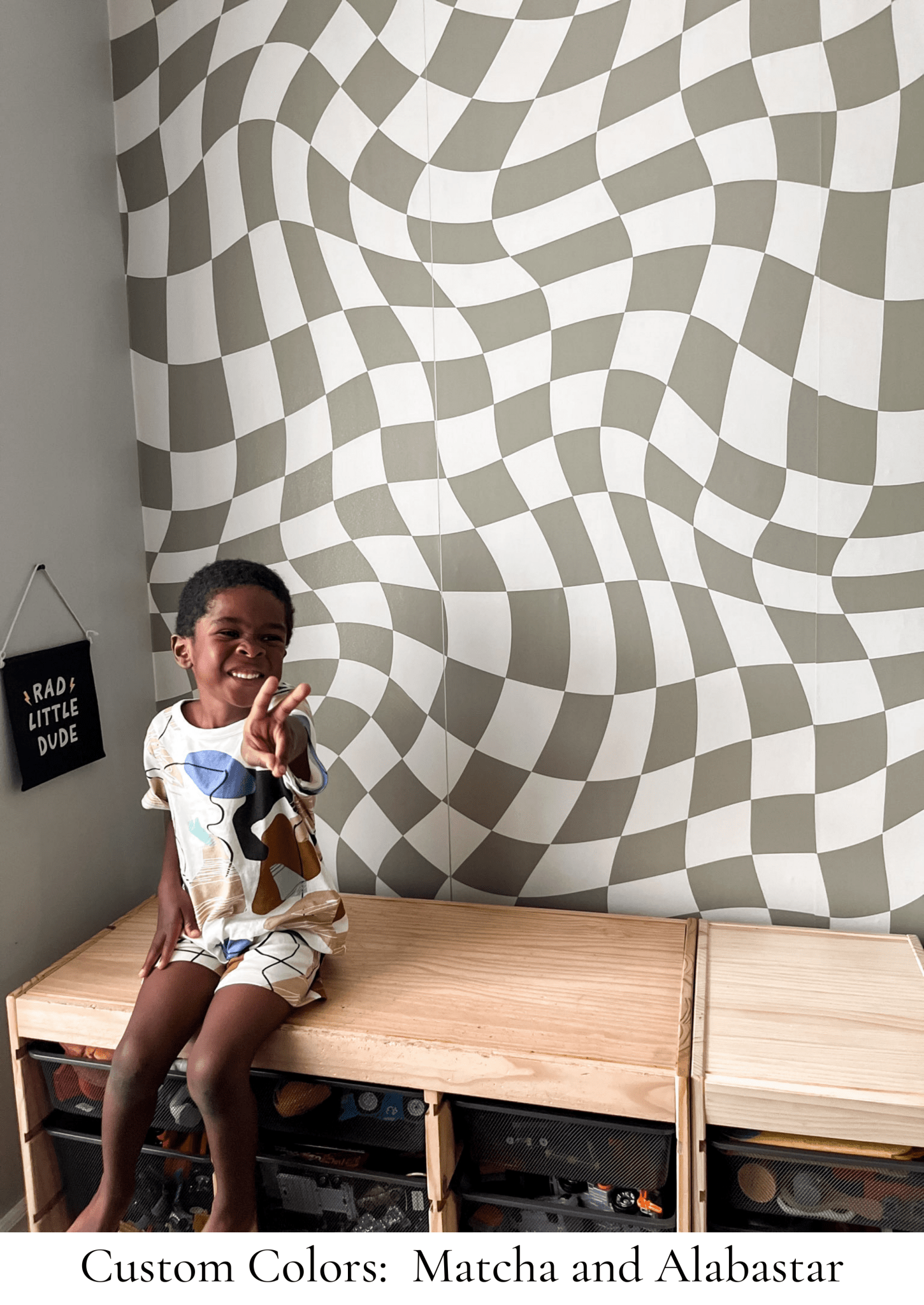 Customizable wavy check wallpaper in soothing neutral tones adds a playful yet sophisticated touch to any room. Perfect for nurseries or playrooms. Peel-and-stick, easy to apply and remove, ideal for renters and redecorators looking to personalize their space