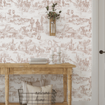 Western-inspired wallpaper behind rustic console table with farmhouse decor