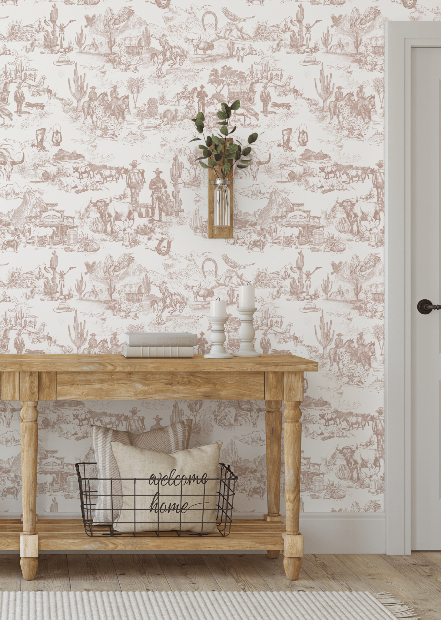 Western-inspired wallpaper behind rustic console table with farmhouse decor