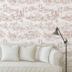 Western Toile wallpaper on living room wall with a neutral sofa