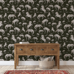 Elegant entryway with dark stallion wallpaper, adding a bold Western flair to the space