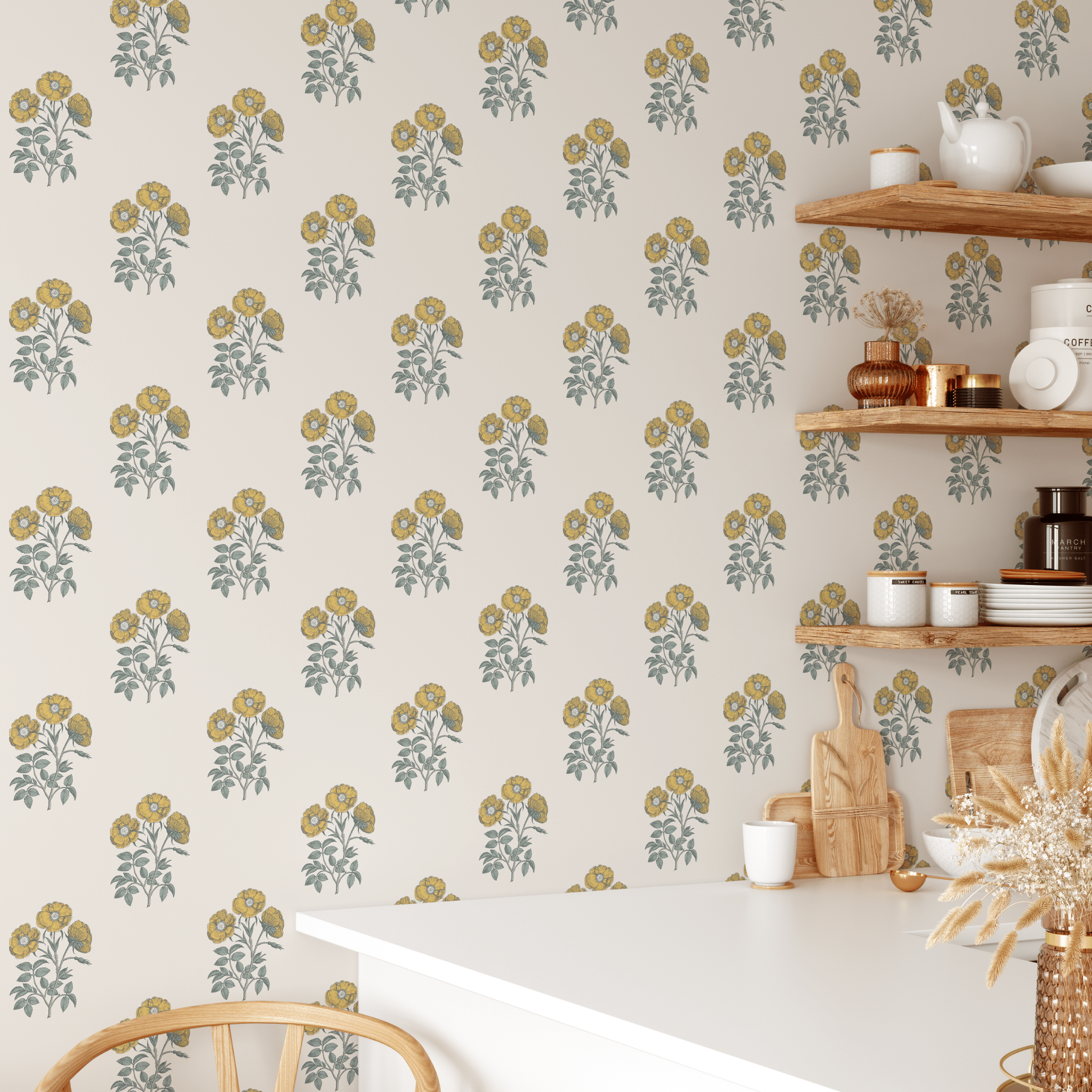 Yellow block print floral wallpaper adorning a cozy kitchen wall with floating shelves and farmhouse decor.