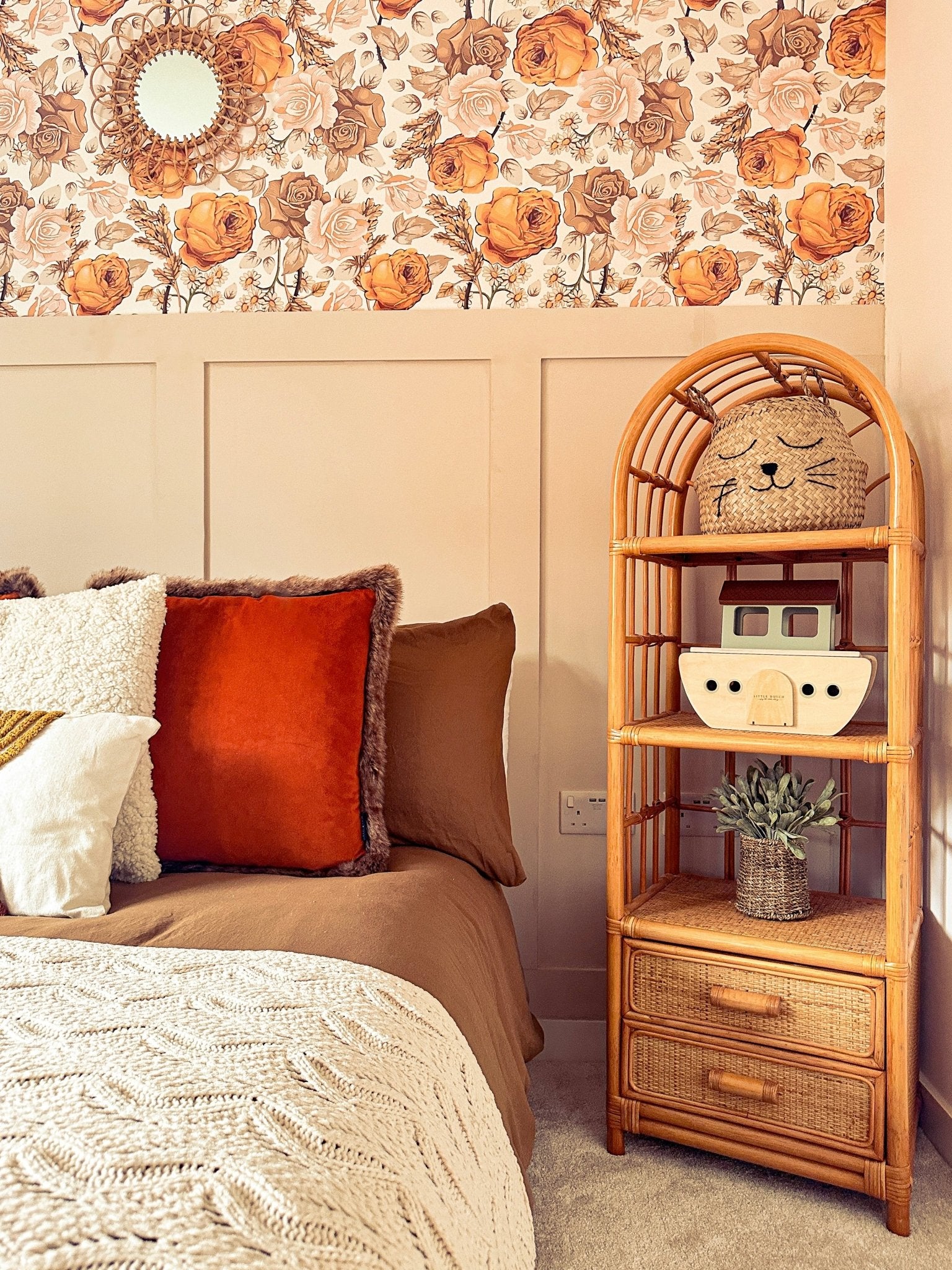 Bohemian Flower Wallpaper and tiki bamboo decorative shelf and bed in a child's room