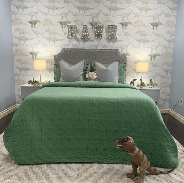 boy bedroom with dinosaur wallpaper