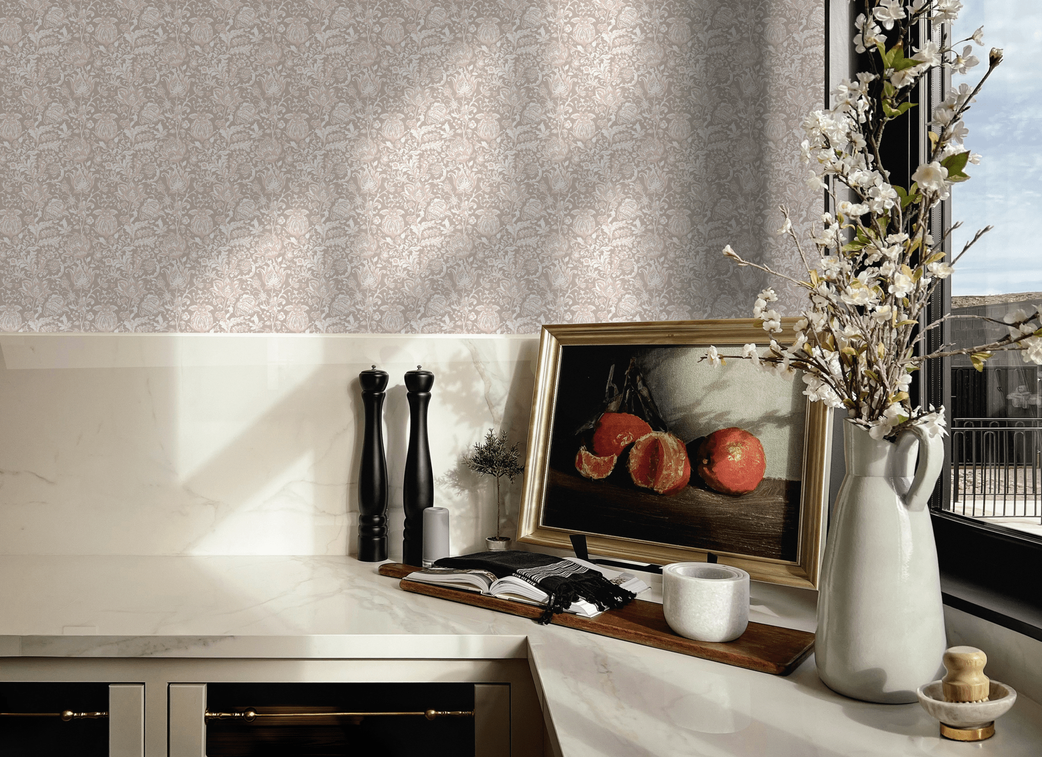Kitchen accent wall with embellished blossom wallpaper, presenting a delicate floral pattern in soft neutral tones.