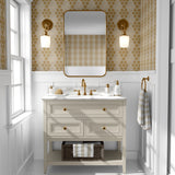 A chic bathroom interior showcases walls adorned with honeycomb flower wallpaper, featuring a pattern of gold hexagons with floral designs, complemented by a white vanity with gold fixtures, white marble countertop, and elegant gold-accented wall sconces