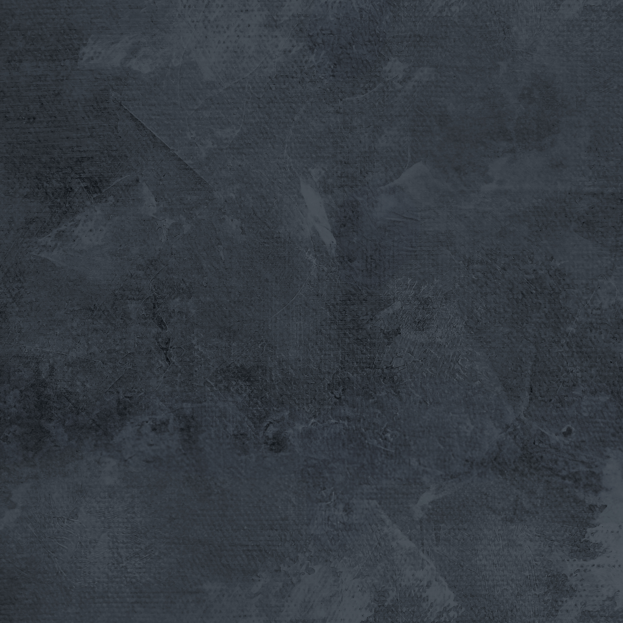Close-up of ink blue limewash wallpaper with a plaster-like finish for interior design.