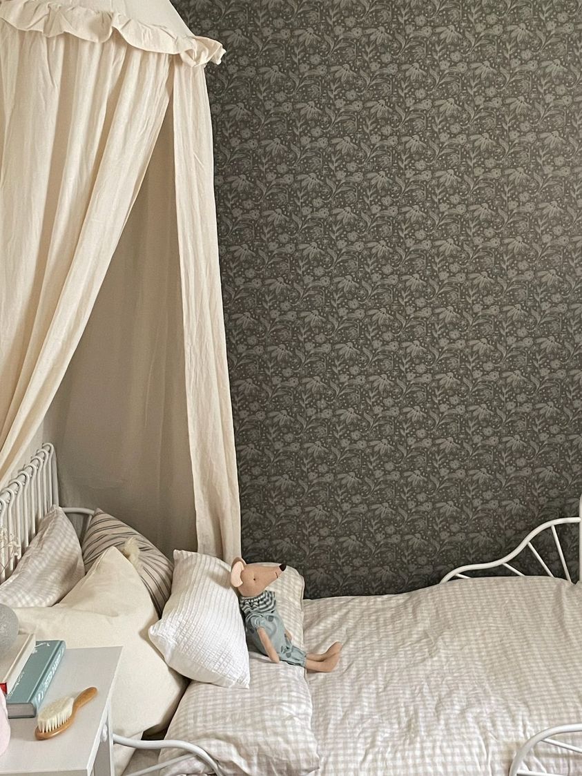Dark Green Dainty floral wallpaper in an aesthetically pleasing child's room