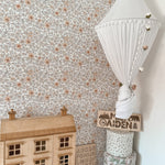 Small flower design wallpaper with orange, white and cream colours, peel and stick minimal floral wallpaper