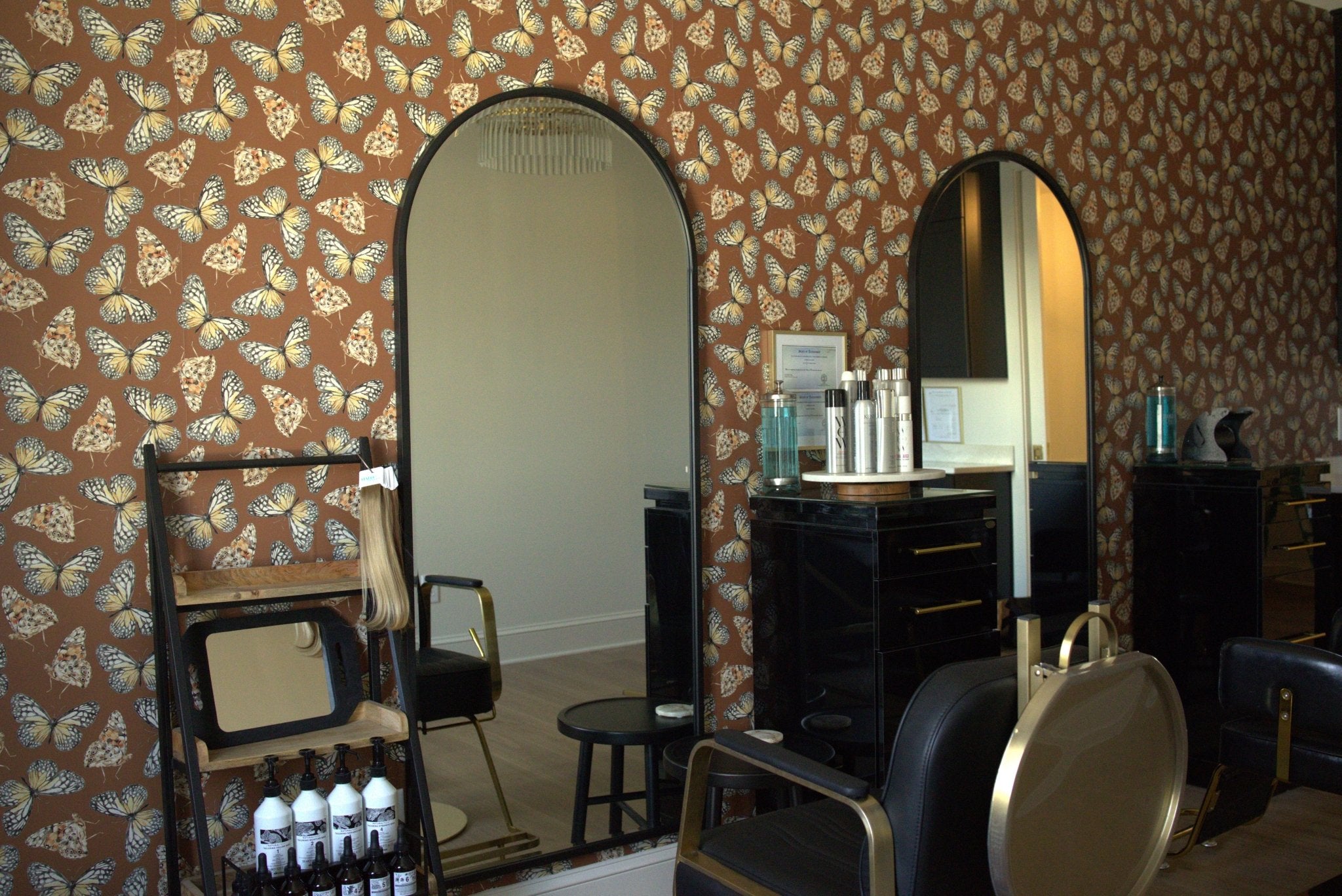 Decorating a hair salon using peel and stick removable wallpaper with butterfly design