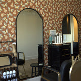 Decorating a hair salon using peel and stick removable wallpaper with butterfly design