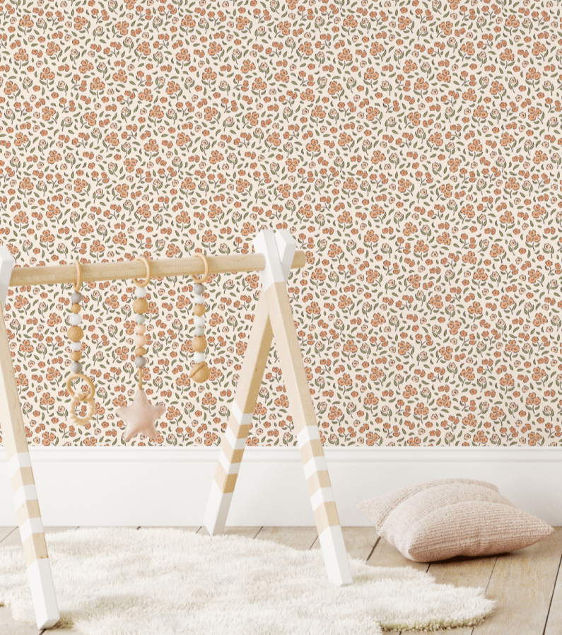 Crib against orange and green flower boho wallpaper with canopy and plush toys.