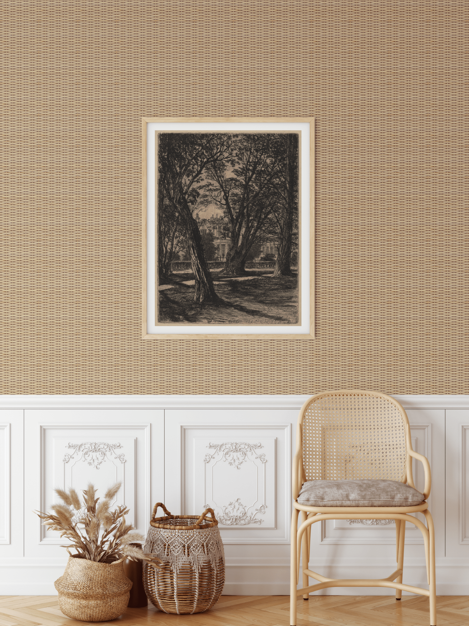 A sophisticated room featuring natural rattan weave wallpaper, a classic wooden chair with rattan detailing, a framed vintage landscape print on the wall, and decorative wicker baskets with pampas grass.