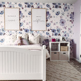 Girls room featuring purple floral peel and stick wallpaper