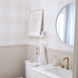 bathroom wallpaper with tan check above wainscotting