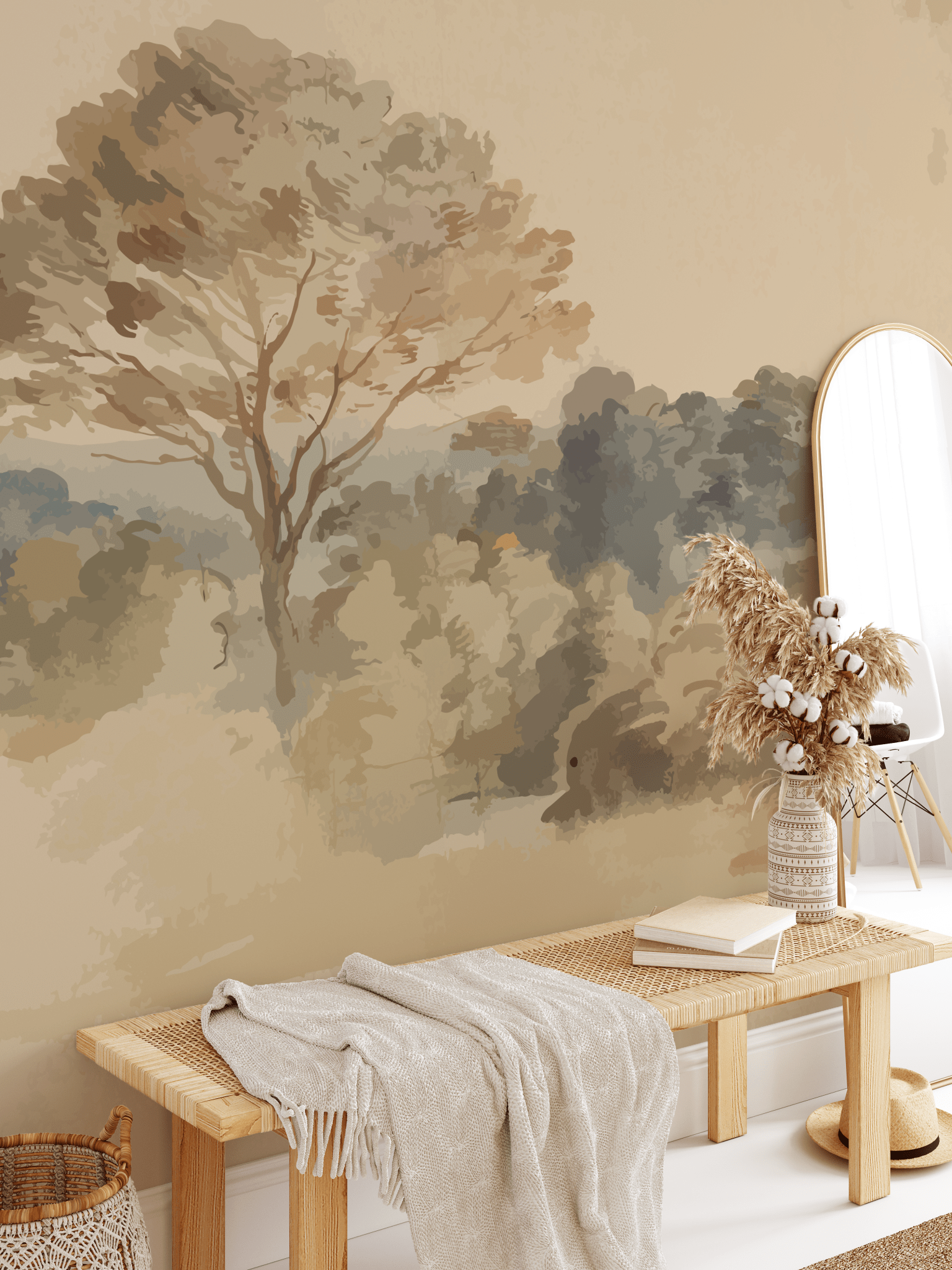 A serene entryway featuring a peel and stick wall mural in a vintage landscape style showcasing a detailed tree. The space is complemented by a wooden bench, a soft throw, a round mirror, and a vase with dried plants.