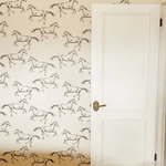 Peel and Stick Wallpaper in a room with neutral decor. Removable wall paper on bedroom wall