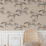 wild horse peel and stick wallpaper above white wainscotting with brown wicker chair and a dark brown wicker basket