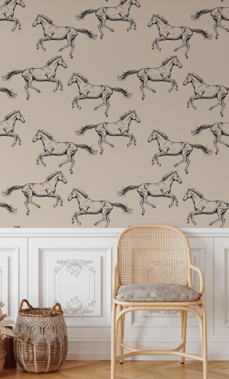 wild horse peel and stick wallpaper above white wainscotting with brown wicker chair and a dark brown wicker basket