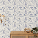 Safari Animal wallpaper featuring wild animals in blue and white in a child's room.